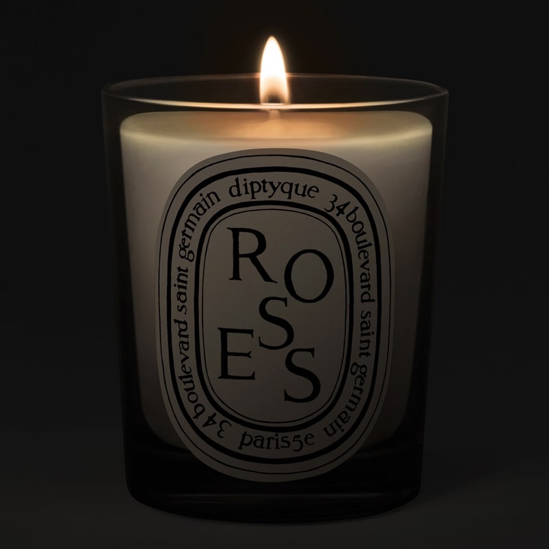 Diptyque Roses Candle - candle shown lit
