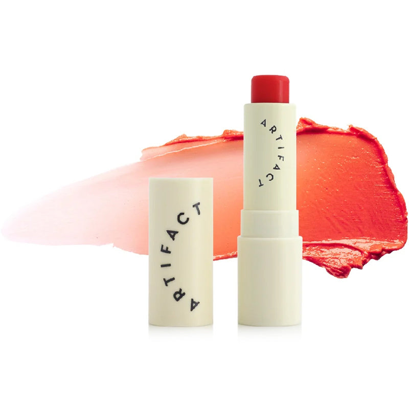 Artifact Soft Sail Blurring Tinted Lip Balm - Lobster Kiss 10 g showing open tube with color swatch in background