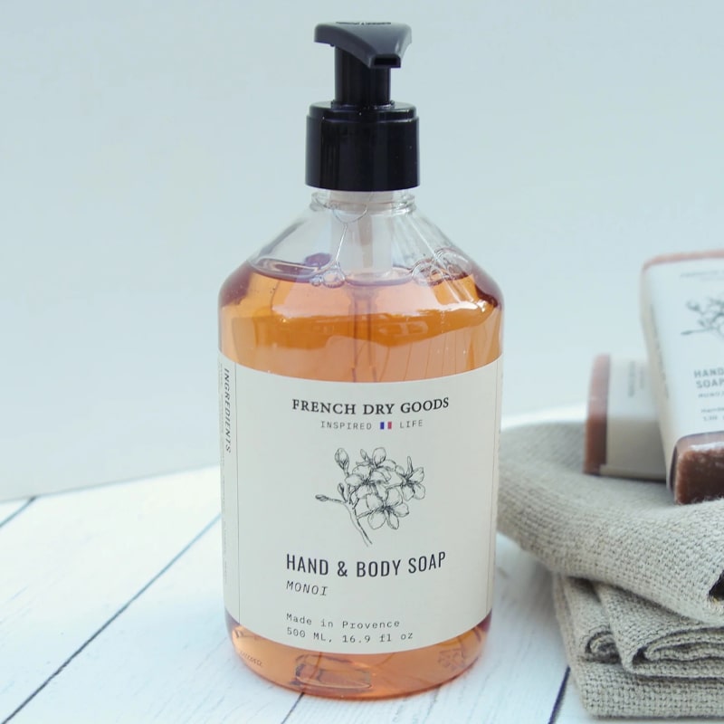 French Dry Goods Hand &amp; Body Soap – Monoi - Product shown on wood table
