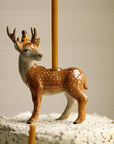 Camp Hollow Stag Cake Topper - Closeup of product on top of cake