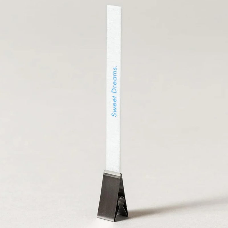 Kunjudo Washi Paper Incense Strips - Mellow Grove - metal clip holding incense paper strip