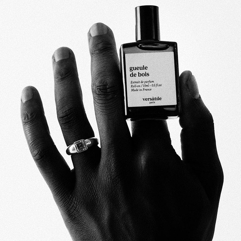 Versatile Paris Gueule de Bois (Hangover) Extrait de Parfum in a model&#39;s hand