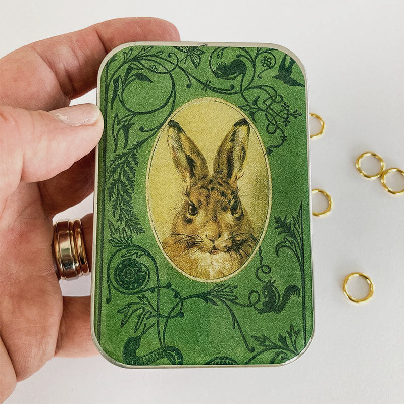 Firefly Notes Bunny Notions Tin - Large - Product shown in models hand