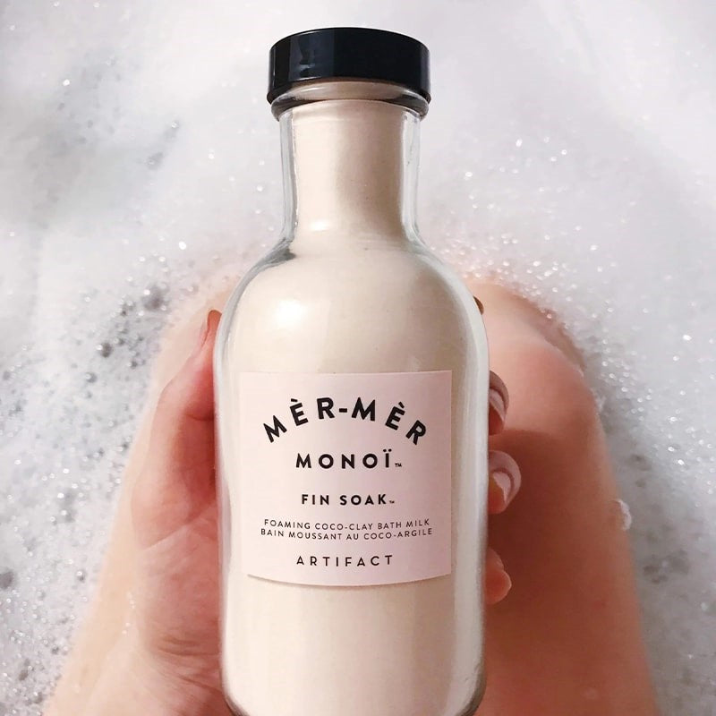 Artifact Mer-Mer Monoi Fin Soak Coco Clay Bath Milk - Product shown in models hand