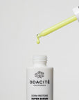 Odacite Edelweiss Extreme™ Derm-Restore Super Serum - dropper filled with serum dropping into bottle