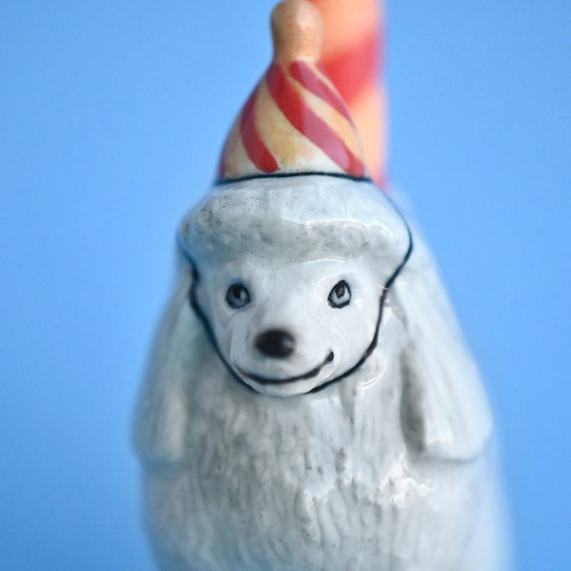 Camp Hollow Poodle Cake Topper - close up of cake topper face front view