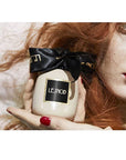 LESNOB x Les Parfums de Rosine No. II Vintage Rose (100 ml) LIfestyle Shot of Woman with Parfum