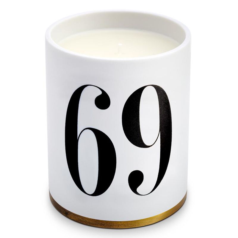 L&#39;Objet Oh Mon Dieu No. 69 Candle sitting on lid/base 