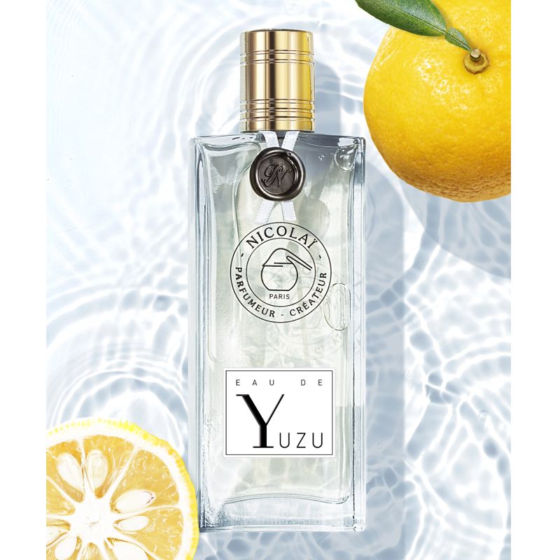 Parfums de Nicolai Eau de Yuzu beauty shot with lemons to give the feel of the fragrance