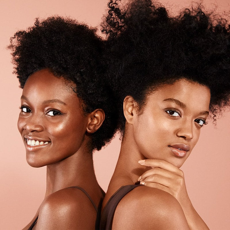 RMS Beauty Master Radiance Base (Deep in Radiance) shown on 2 African-American models with different skin tones