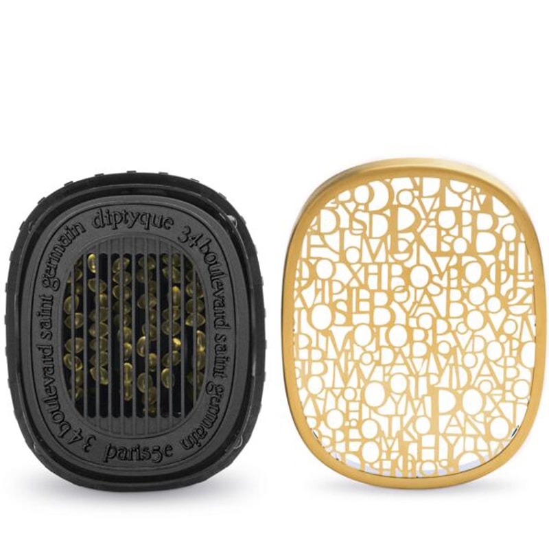 Diptyque Electric Diffuser Plug shown with cover off where to place scent cartridges (sold separately)