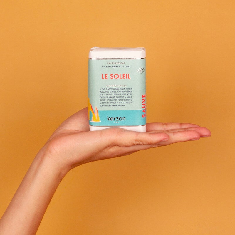 Shot of Kerzon Scented Soap Bar – Le Soleil (Sun) shown in models hand