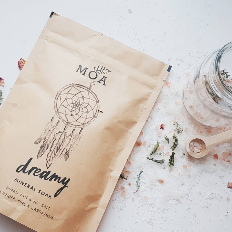 MOA Dreamy Mineral Soak (400 g) pouch with a pile of the Mineral Soak salts shown next to it