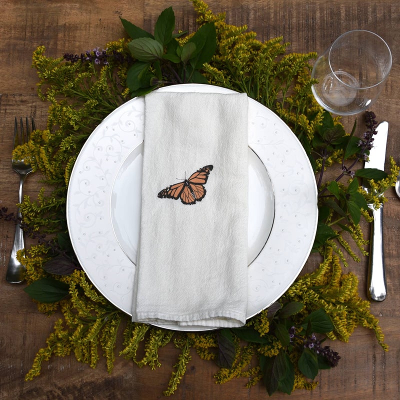 June &amp; December Monarch Napkins Set - Lifestyle shot showing other pattern on table setting