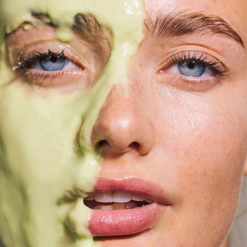 Odacite Green Smoothie Quenching Creme shown very thick on model&#39;s face - Beauty Shot