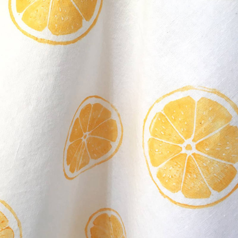 Kelsi Cross Studios Printed Tea Towel – Lemon Block - closeup of imprint - looks more orange than yellow