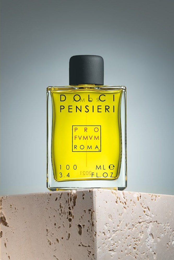 Profumum Roma Dolci Pensieri Eau de Parfum - beauty shot of bottle on corner of stone