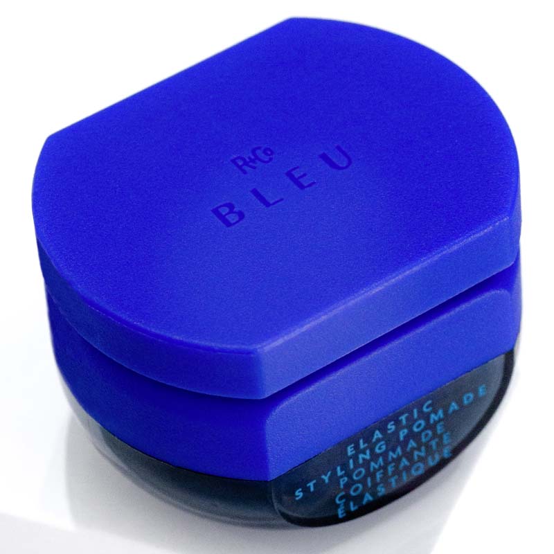 R+Co Bleu Elastic Styling Pomade showing jar at an angle. 