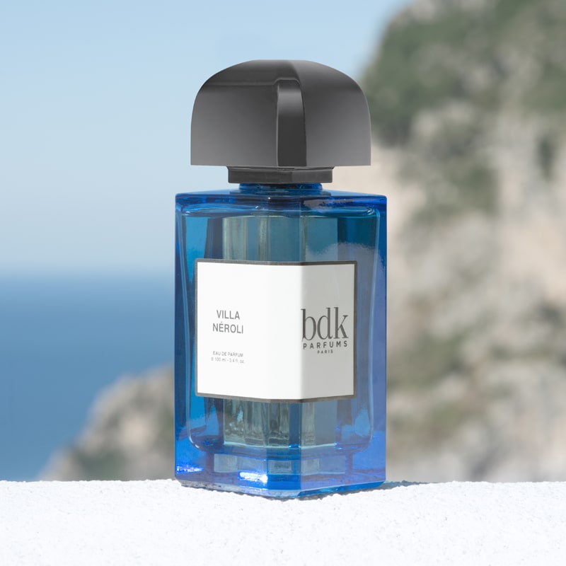BDK Parfums Villa Neroli Eau de Parfum sitting with an ocean view 