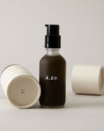 A.OK Body Oil showing lid off 