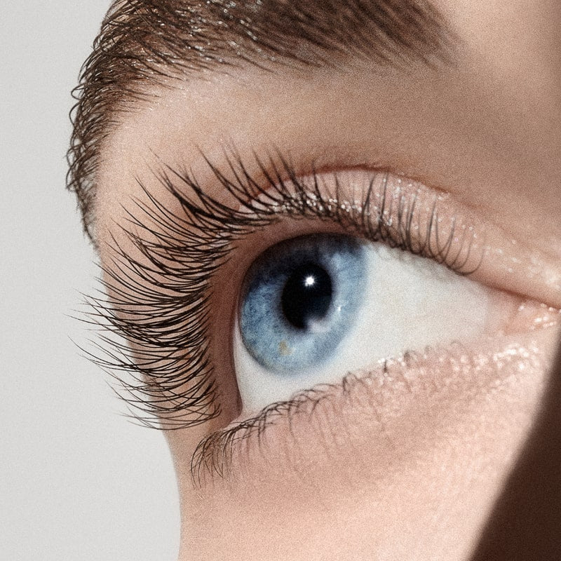Augustinus Bader The Eyebrow and Lash Enhancing Serum showing model&#39;s eye lashes and brow