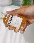 Verden D'Orangerie Bath Oil - Product shown being dispensed in models hand
