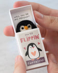 Marvling Bros Ltd You're Flippin' Fantastic Wool Felt Penguin In A Matchbox showing open matchbox in model's hands for size perspective