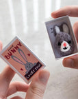 Marvling Bros Ltd Some Bunny Loves You Wool Felt Rabbit In A Matchbox - Product shown in models hands