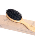 Neil Naturopathic Boar Bristle Brush - Product displayed on top of box