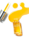 Cinq Mondes Nourishing Precious Elixir Facial Oil - Product drop shown next to product