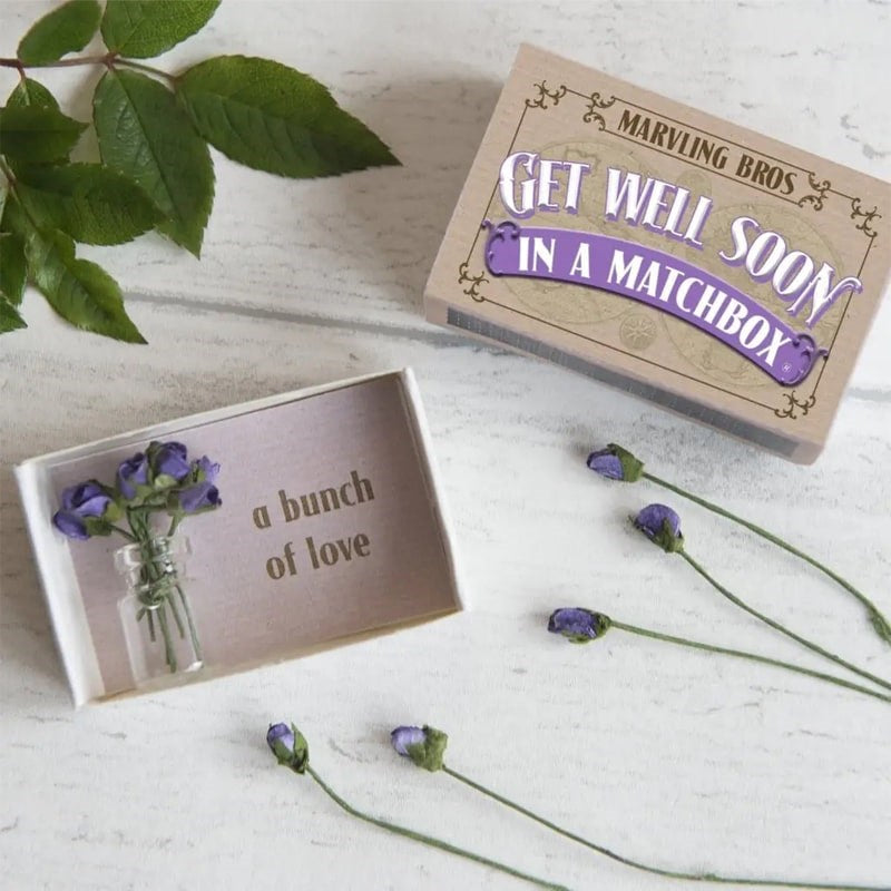 Marvling Bros Ltd Get Well Bunch Of Roses In A Vase In A Matchbox - Product displayed on table with lid off