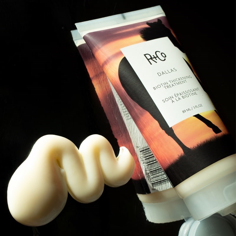 R+Co Dallas Biotin Thickening Hair Treatment - Product smear shown next to product