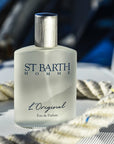 St. Barth Homme L'Original Eau de Parfum in a lifestyle photo with a ship's rope