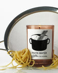 D.S. & Durga Pasta Water Candle - Product shown with pasta and strainer