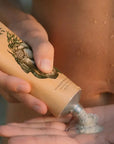 Wonder Valley Seaweed Body Scrub - Model shown dispensing product into hand