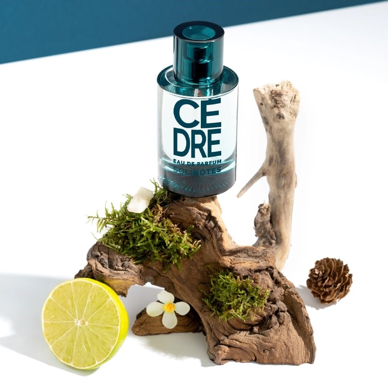 Solinotes Cedar Eau de Parfum - Beauty shot product shown with bark and citrus