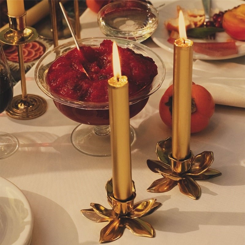 Trudon Gold Plated Flower Candlestick Holder - Product displayed on table