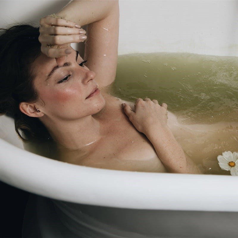 Pursoma Tubmarine Detox Bath Treatment - Model shown in bath tub