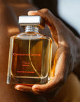 Ormonde Jayne Tolu Eau de Parfum (88 ml) - Product shown in models hand