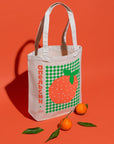 Gucha Gucha Orange Apelsin Tote Bag - Product shown on orange background