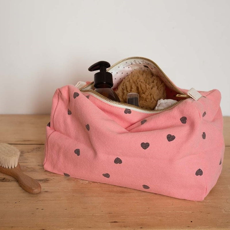 Rose in April Heart Toiletry Bag - Pink - Product shown on wood table