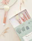 Bachca Paris Professional Makeup Brush Set - Natural - open box showing brushes next to crumbled makeup