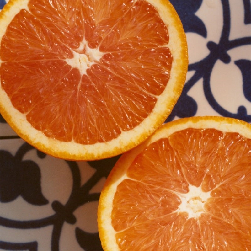 Marmalade Grove Cara Cara &amp; Hibiscus Marmalade - Overhead shot of cut orange