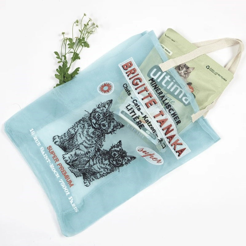Brigitte Tanaka Organza Embroidery Cat Bag - On white background with foliage
