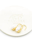 Varvara Minimalist Natural Pearl 18k Gold Plated Earrings - Product shown on top of pouch