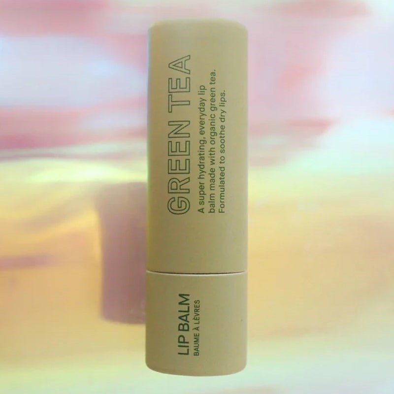 Pink House Organics Lip Balm - Green Tea - Product shown on colorful background