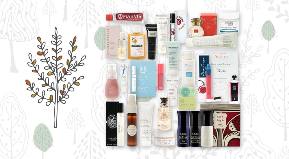 The Holiday Beauty Bonus banner with seasonal art showing the 26 Piece Gift With Purchase of samples and deluxe minis