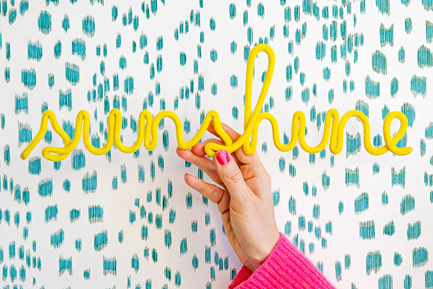 Model holding Bombay Duck Sunshine Rope Word in Yellow