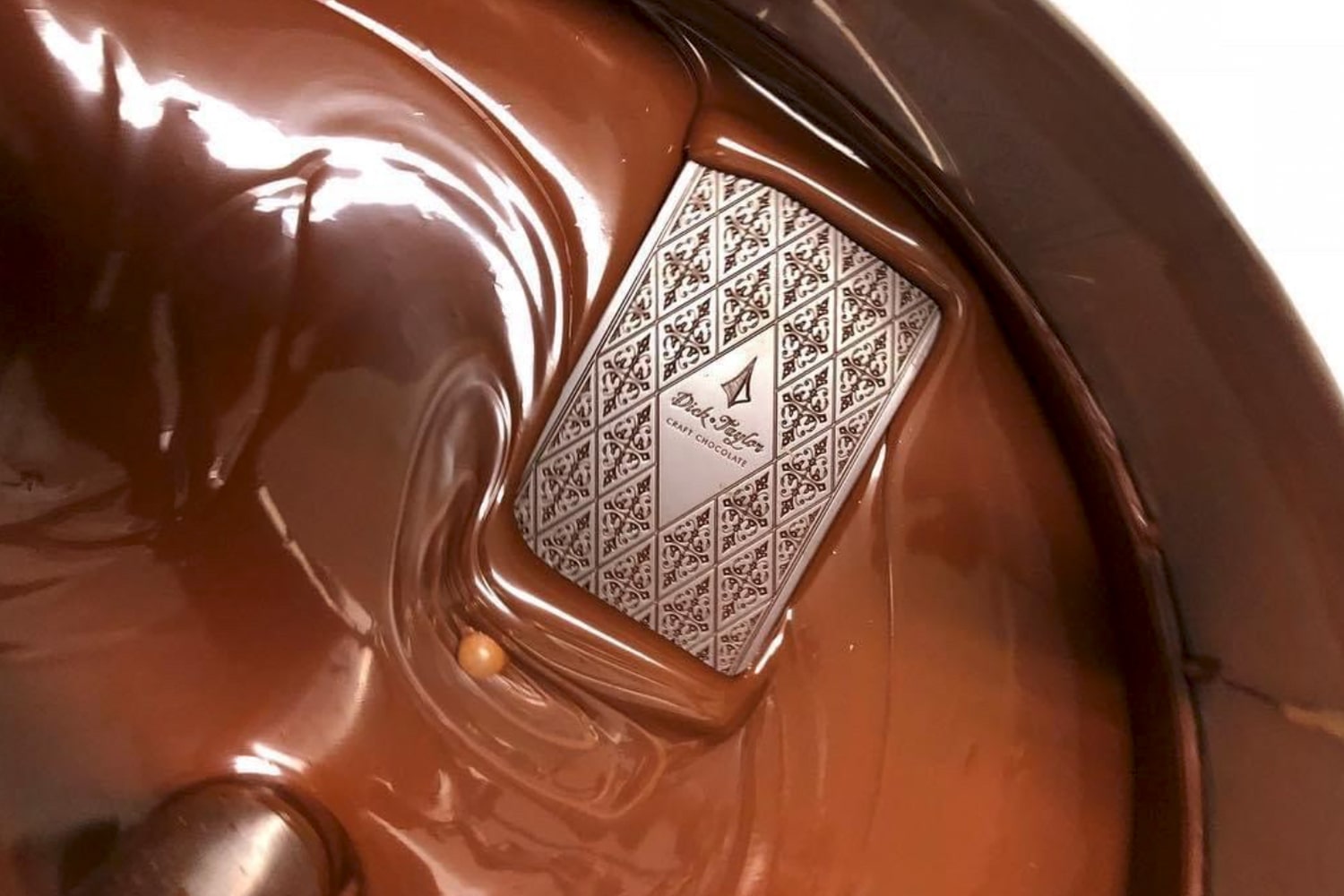 Dick Taylor Craft Chocolate bar sitting liquid smooth chocolate 