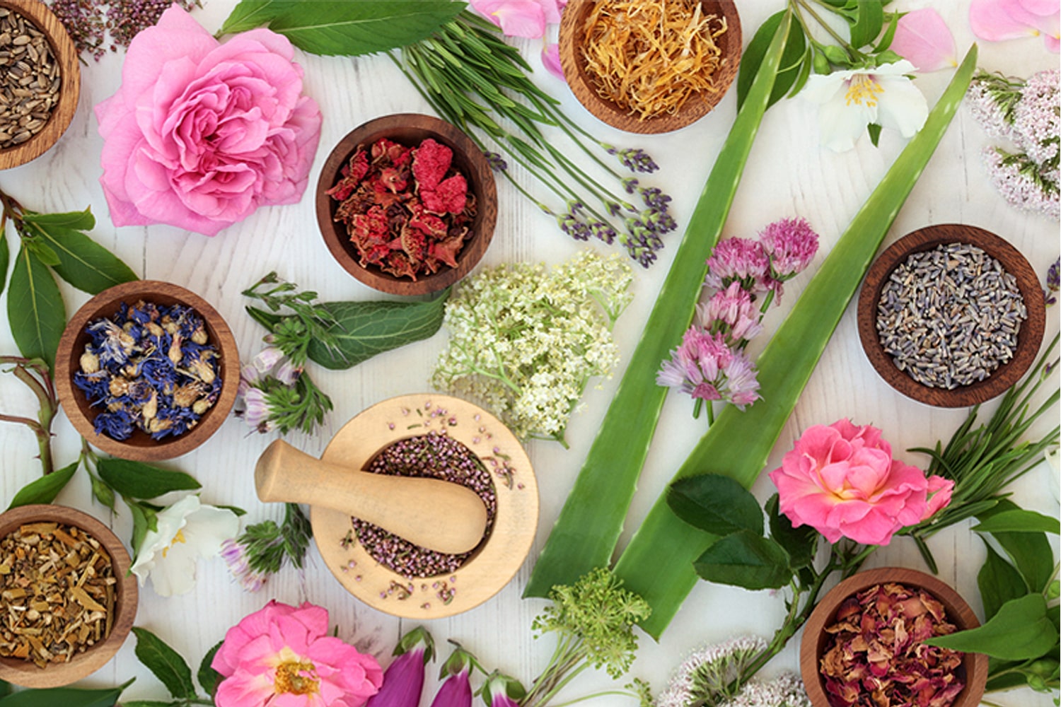 A variety of ingredients shown top view used in Dresden Essenz Bath Salts